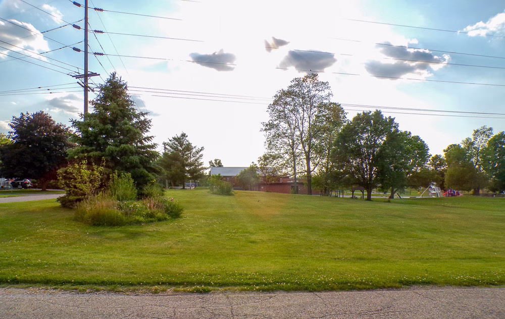 Property for auction on 8/6/26, located at the NW corner of N 50 E & Market St, Howe, IN 46746